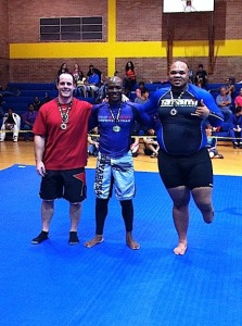 Tony Nicholson (right) placed in the purple belt division in Jackson, Miss. April 11.