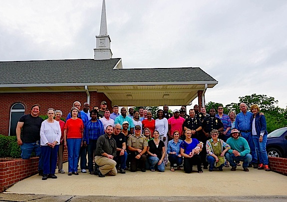 Members of the Canal Heights church of Christ along with members of the Demopolis Police Department and their families.