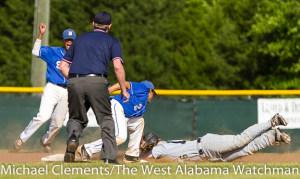 Jamarcus Ezell makes the call as Ryan Schroeder applies the tag on a base stealing attempt by an Alabama Christian base runner.