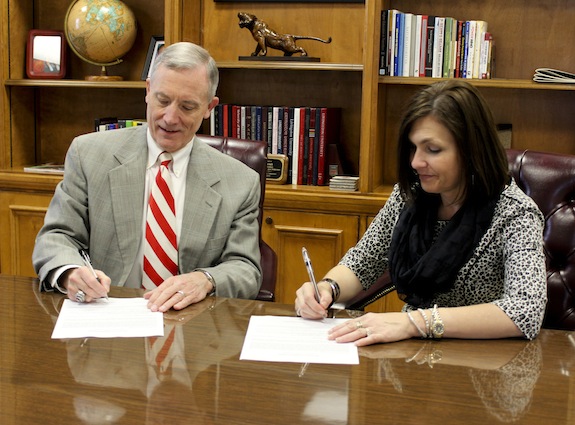 UWA President Ken Tucker and Shelton State President Andrea Mayfield have inked an agreement between the two schools to offer a reverse transfer credit for a program that will allow students to earn a degree from Shelton State then transfer to UWA for a bachelor’s degree.