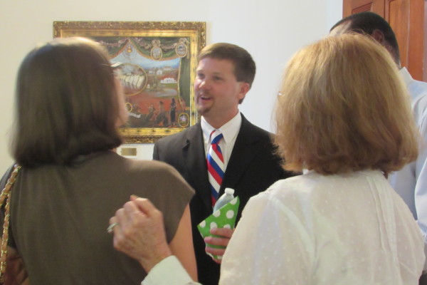 Kyle Kallhoff talks with community members following his interview Wednesday at Rooster Hall. (Photo by Jan McDonald)