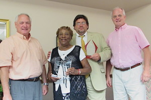 Hospital CEO Art Evans, former board chair Annye Braxton, former board member Tom Perry, and current board chair Jay Shows.