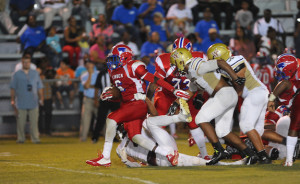 (Photo by Johnny Autery) Linden's Charles Blackmon heads for running room Thursday night against Washington County.
