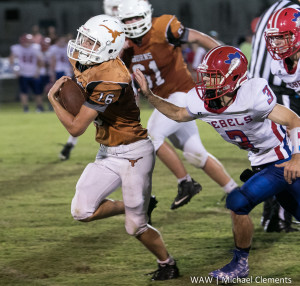 9-17-2015 - Linden, Ala. - Marengo Academy's Zac Murphy attempts to elude a South Choctaw tackler.