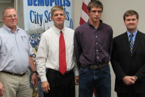 Eighth grader Devin Foster with Board Member Olen Kerby, DMS Principal Blaine Hathcock and Superintendent Kyle Kallhoff.