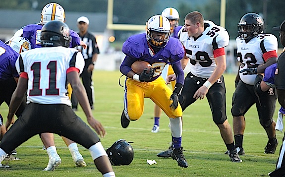 Hard nose RB Jaylin Johnson (23) nears the goal line in first half action.