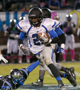 10-31-2015 - Auburn, Ala. - Demopolis' A.J. Collier breaks away from would-be tacklers after a reception.