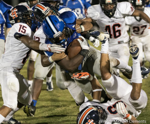11-5-2015 - Demopolis, Ala. - Demopolis' Jay Craig fights for yardage against Charles Henderson. Craig ended up with 217 yards rushing on the night.