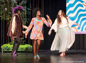 From left Puck, the knavish sprite, played by Tyler Ward, enters fairy land dancing with fairies Marlana Mitchell and Catherine Akins. (WAW | Michael Clements)