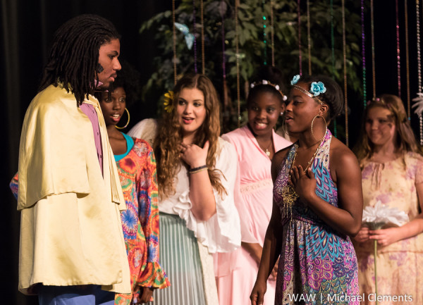 Fairy King Oberon, left, played by Tristan Mullen, challenges Fairy Queen Titania, second from right, played by Caitlin Robertson, as her fairies Marlana Mitchell, Catherine Akins, Taneisha Robertson and Audrey Akins look on in amazement. (WAW | Michael Clements)