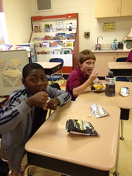 Thomasville third graders Omarion Bettis and Jay Howell enjoyed their science lesson on chemical change, but they enjoyed eating the results best!