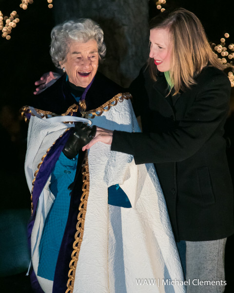 Demopolis, Ala. - 12-3-2015 - Rebecca Hasty (right) named Martha Griffith (left) as St. Nick for COTR 2015 at the Demopolis square on Thursday night.
