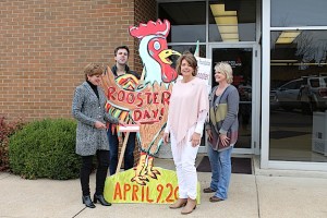 Lisa Compton, chairman; Kirk Brooker, curator of the Marengo County Historical Society; Diane Brooker, chair of the auction, and Shelley Wood, chair of the Rooster Fair in Public Square. With the check that Diane is presenting to Lisa, the Alabama Power Foundation becomes a Rooster Booster.