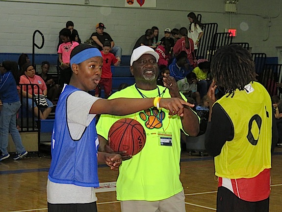 Demopolis Middle School basketball coach and physical education teacher Jesse Bell readies to start a 5-on-5 game during Friday's Hoops 4 Heart event to benefit the American Heart Association. The school has raised more than $51,000 in the last six years for the AHA.