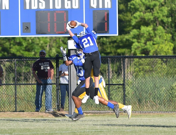 Matt Beckum skies for an interception against Kemper County (Miss.) Friday during the Demopolis football jamboree.