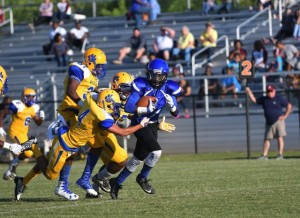 (Photo by Johnny Autery) Antonio Besteder runs through the Kemper County defense for a Demopolis first down. 