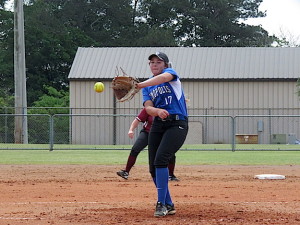 Natalie Tatum attempts to field a comebacker against Shelby County.