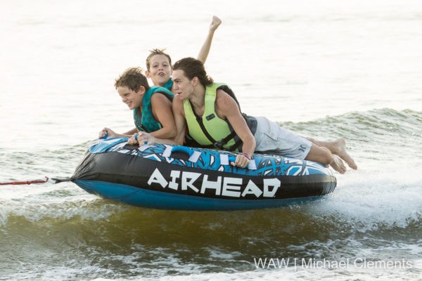 (L-R) Stephen Barkley, William Barkley and Dalton Holtzclaw enjoy a late afternoon tube ride on the Tombigbee River.