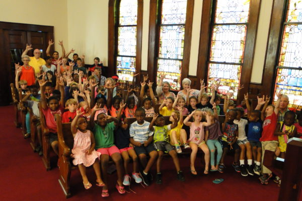 VBS students send a sign language message to students of Isaiah 55 Ministries. (Contributed Photo)