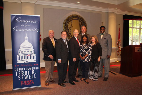 Congresswoman Terri A. Sewell, third from right, hosted “Congress in Your Community” on the University of West Alabama campus Tuesday. More than 100 community members greeted her, including, from left, UWA Provost Tim Edwards, Livingston Mayor Tom Tartt, UWA President Ken Tucker, Sumter County District 6 Commissioner Pat Ezell, York Mayor Gena Robbins, and Sumter County Commission Chairman Marcus Campbell. (Contributed Photo)