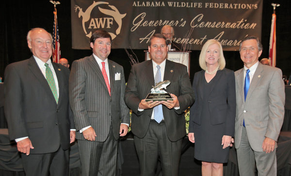 Alabama Marine Resources Division Director Chris Blankenship received the inaugural Fisheries Conservationist of the Year at the recent Alabama Wildlife Federation Governor’s Conservation Achievement Awards banquet in Prattville. Presenting the award, from left, are Horace Horn with PowerSouth Energy, AWF President Angus Cooper III, Susan Comensky with Alabama Power Company and Conservation Commissioner N. Gunter Guy Jr. Blankenship was cited for his work to improve red snapper management in the Gulf of Mexico. (Contributed Photo)
