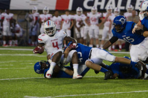 08-18-16 -- Montgomery, Ala. -- Hillcrest's Brian Robinson (4) is taken down by Demopolis' Russ Logan (43) and Tavian Brown (25) in Thursday's Champions Challenge at the Crampton Bowl in Montgomery, Ala. (WAW | Stewart Gwin)