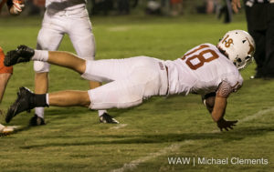 Monroeville, Ala. -- 9-2-2016 -- Marengo Academy's Hayden Megginson dives in for the Longhorns' first score during Friday night's game against Monroe Academy.