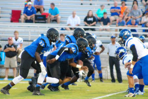 09-09-16 -- Demopolis, Ala. -- The Demopolis defense fires off the ball and looks to cause havoc in the Bulldog backfield during a 49-7 win over Marbury Friday night. (Special to WAW | Glenda Bradley)