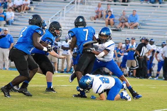 09-09-16 -- Demopolis, Ala. -- Dez Jackson looks to shake a tackle on the Tigers' first snap of the game against Marbury. (Special to WAW | Glenda Bradley)