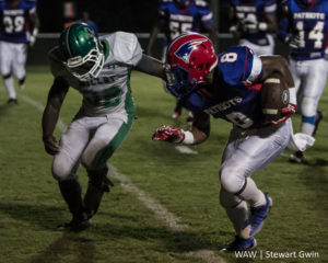 09-16-16 -- Linden, Ala. -- Linden's Makahi Williams (8) jukes Millry's Emmanuel Mitchell (32) in Friday's game in Linden, Ala. The Patriots extended their three-game shutout streak, beating Millry 54-0. (WAW | Stewart Gwin)