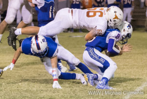 10-21-16 -- Toxey, Ala. -- Marengo Academy's Collin Sheffield goes over the top of a block for a sack during the Longhorn's win over the South Choctaw Academy Rebels.