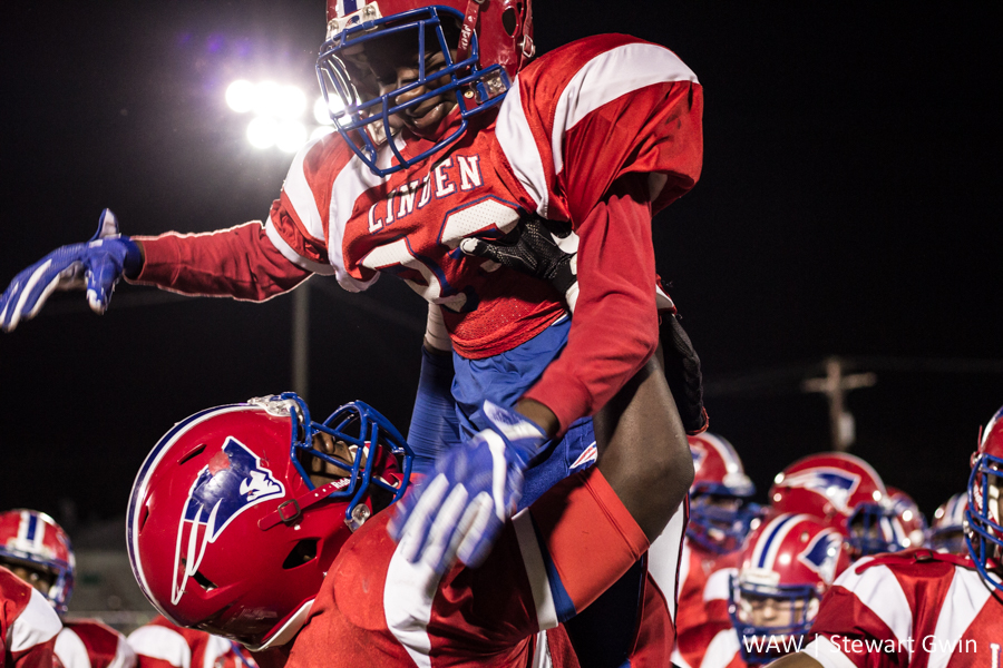 10-27-16 -- Linden, Ala. -- Timothy Thurman lifts Johnathan Biggs in celebration as the fourth quarter starts in Thursday night's game in Linden. Linden led by a score of 68-0 going into the fourth and went on to beat Choctaw County by a final of 68-0, finishing the regular season with a 10-0 record. (WAW | Stewart Gwin)