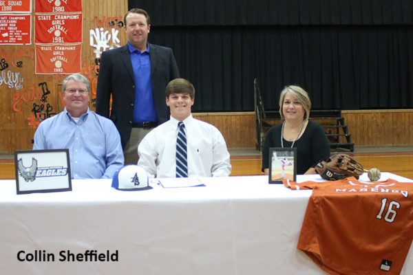 11-7-2016 -- Linden, Ala. -- Brad Collins (center) signed to play baseball with Alabama Southern Community College. Brad is shown with his parents (seated) Tim and Angie Collins and Alabama Southern baseball coach Daniel Head (standing). (Photo courtesy of Collin Sheffield)