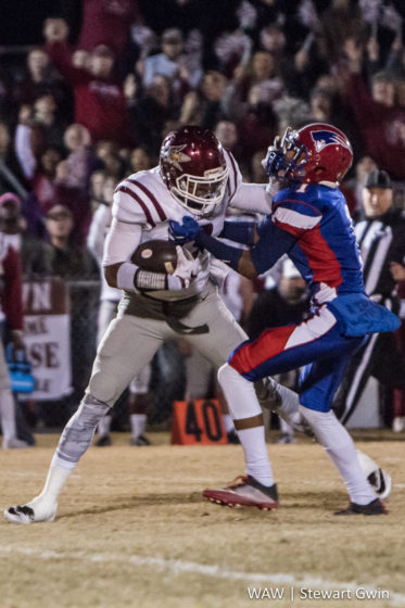 11-25-16 -- Linden, Ala. -- Linden's Isaiah Scott (1) tussels with Maplesville's Nathaniel Watson (13) in Friday night's game in Linden. Linden fell to Maplesville by a final score of 36-14. (WAW | Stewart Gwin)