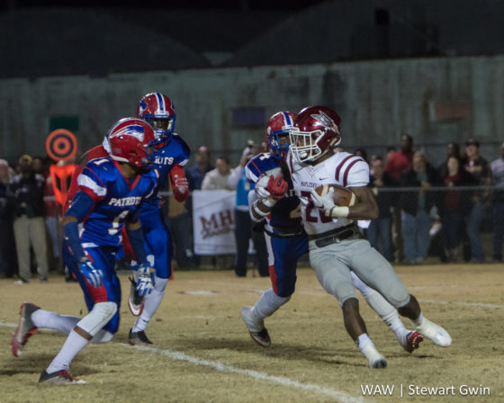 11-25-16 -- Linden, Ala. -- Terence Dunlap (28) is met in the backfield by Linden's Isaiah Scott (1), Charles Blackmon Jr. (6), and Devontae Poole (4) in Friday night's game in Linden. Linden fell to Maplesville by a final score of 36-14. (WAW | Stewart Gwin)