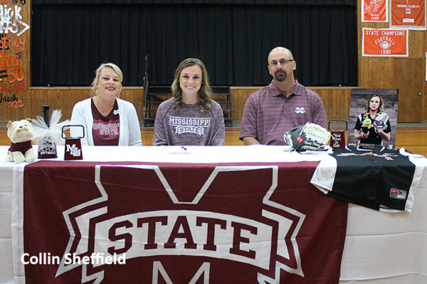 11-7-2016 -- Linden, Ala. -- Macey Petrey (center) signed to play softball for Mississippi State University. Macey is shown with her parents, Ashley and Chris Petrey. (Photo courtesy of Collin Sheffield)